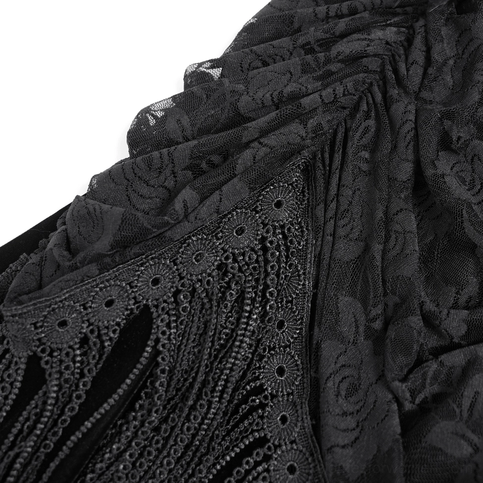 Gothic black velvet dress detail of lace-up corset back construction and fringe trim