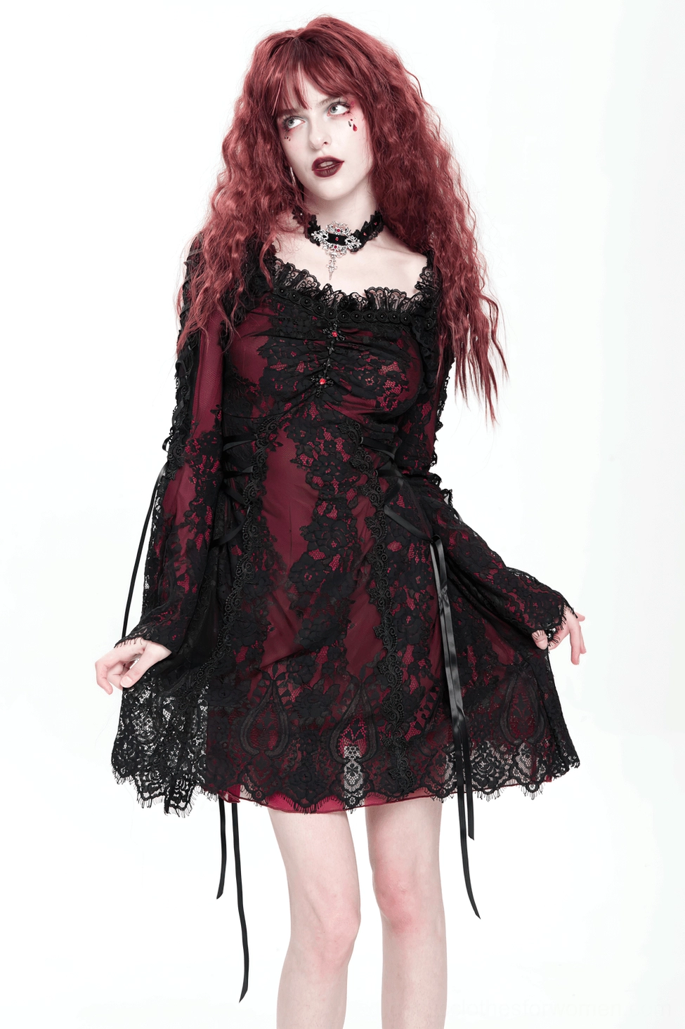 Gothic alternative fashion mini dress detail view of decorative lace patterns and structural construction elements