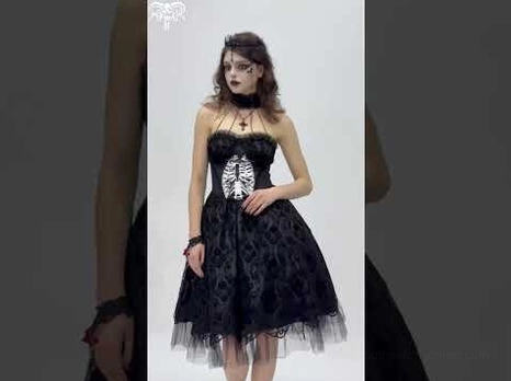 Cropped detail of gothic halter dress showing ribcage chest print and lace bodice construction
