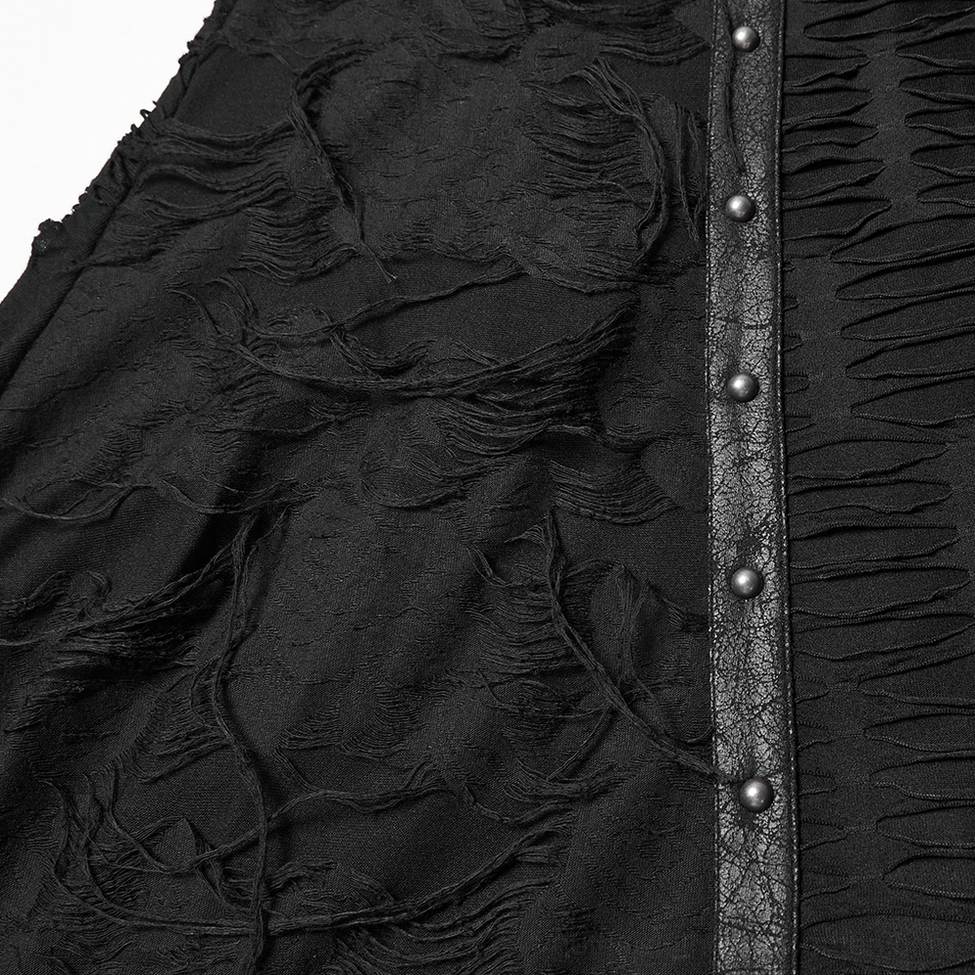 Close-up fabric detail showing distressed ragged knit texture and leather trim with metal studs