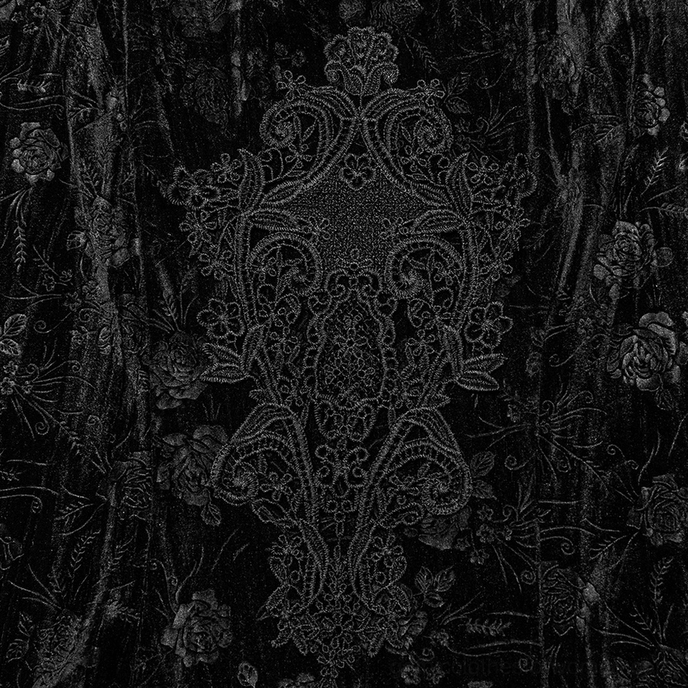 Close-up detail of black velvet rose gothic dress front embroidery panel featuring vintage damask pattern on rose velvet