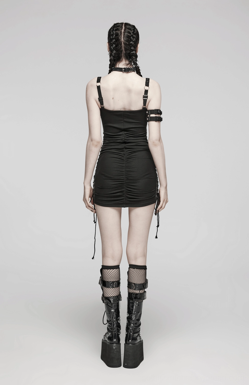 Black gothic dress detail shot showing eyelet strap positioning and sweetheart neckline construction