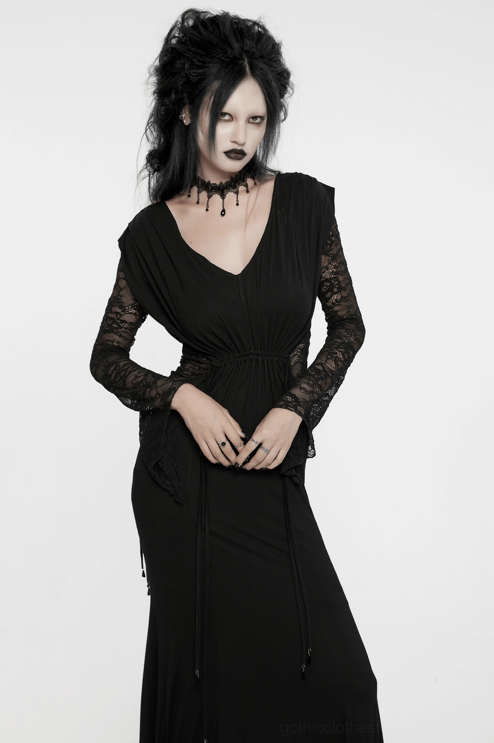 Black gothic maxi dress fabric swatch showing matte knit and premium lace overlay composition