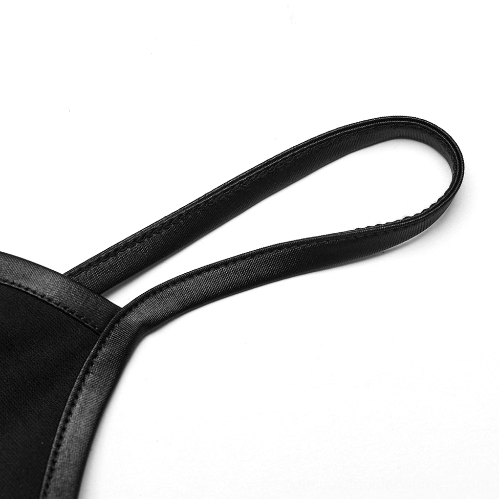 Close-up detail of faux leather shoulder strap with stitched trim on gothic maxi dress