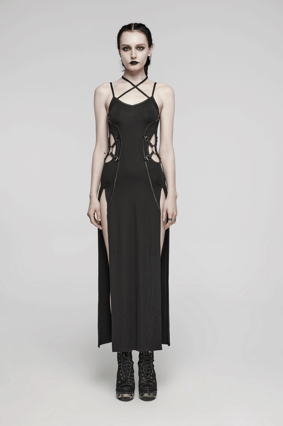 Black gothic dress detail shot showing faux leather waistband dividing line and curve-defining silhouette