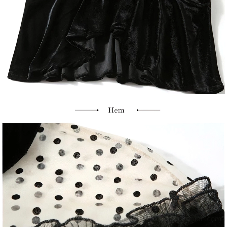Detail shot of black velvet gothic dress ruffled fishtail hem showing layered velvet construction and texture on white background