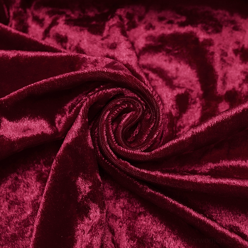 Flared lace-trimmed sleeve cuff detail of crimson velvet gothic dress showing ruffled court-style design and black lace trim