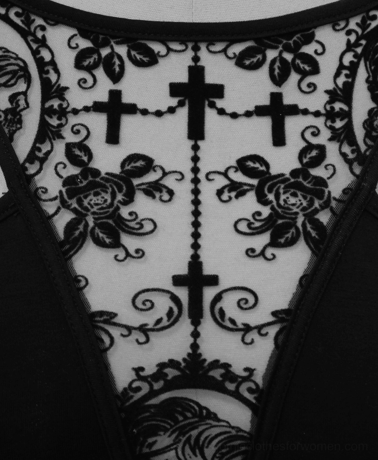 Gothic black lace dress floral panel detail showing sheer mesh base with cross and rose vintage pattern