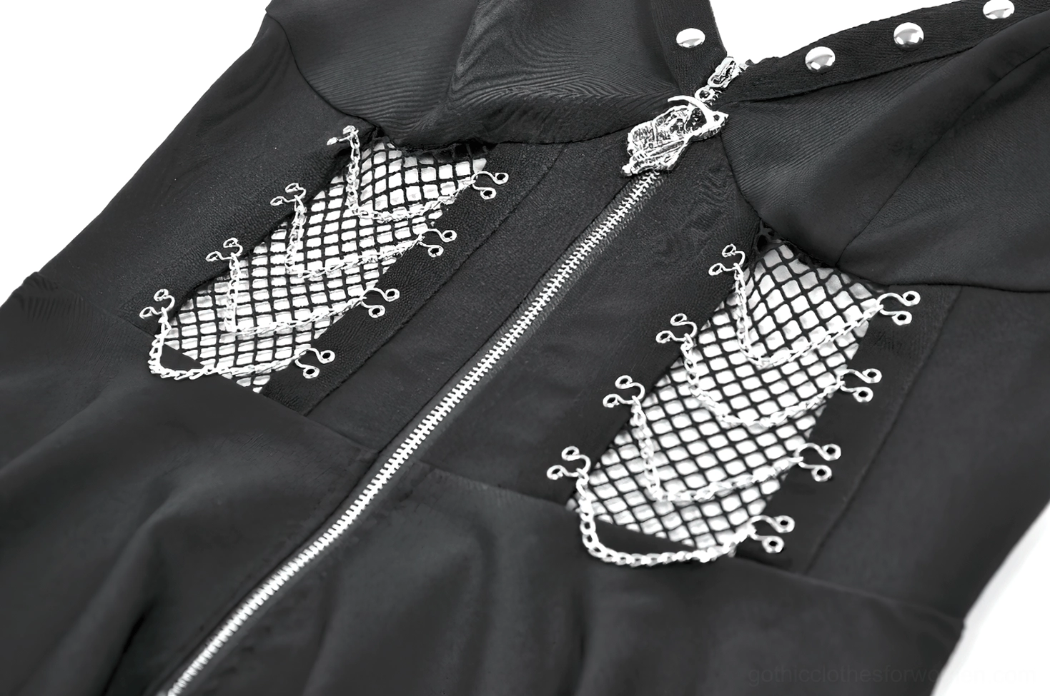 Close-up detail of black gothic dress front cutout showing fishnet panel, metal chain trim, and zipper fastener mechanism on dark background