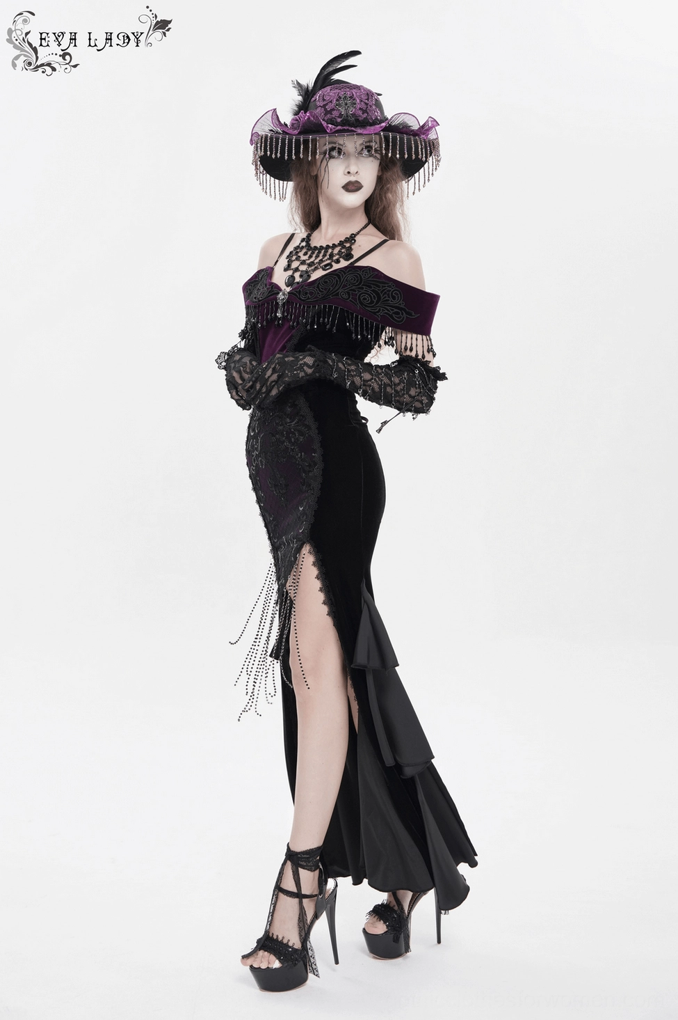 Off-shoulder gothic dress lower hemline detail showing ruffled train and floor length measurement