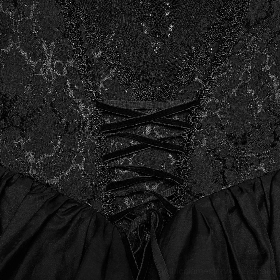 Close-up detail shot of black gothic dress lace and corset section, showing floral lace texture, ribbon lace-up detailing, and satin ruffle fabric construction