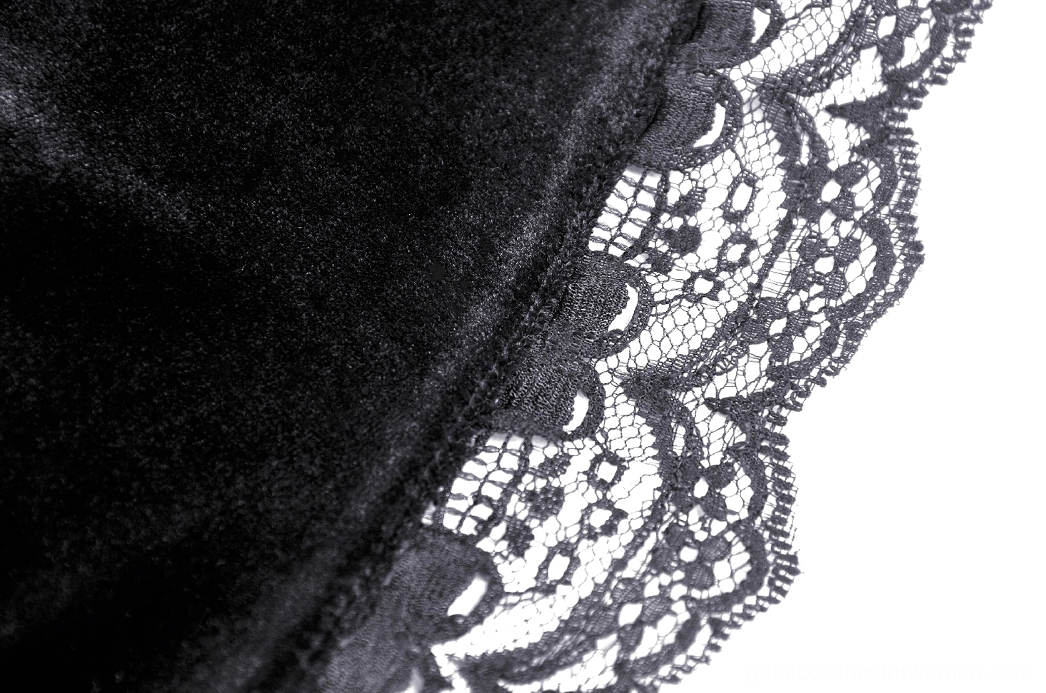 Lace cuff trim detail of gothic velvet dress showing intricate beading and sheer embroidery