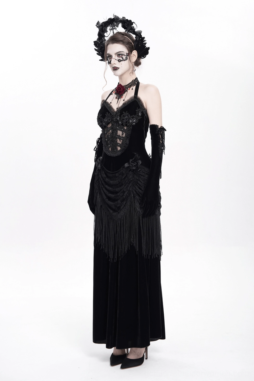 Gothic black velvet dress close-up of lace and fringe embellishments and construction