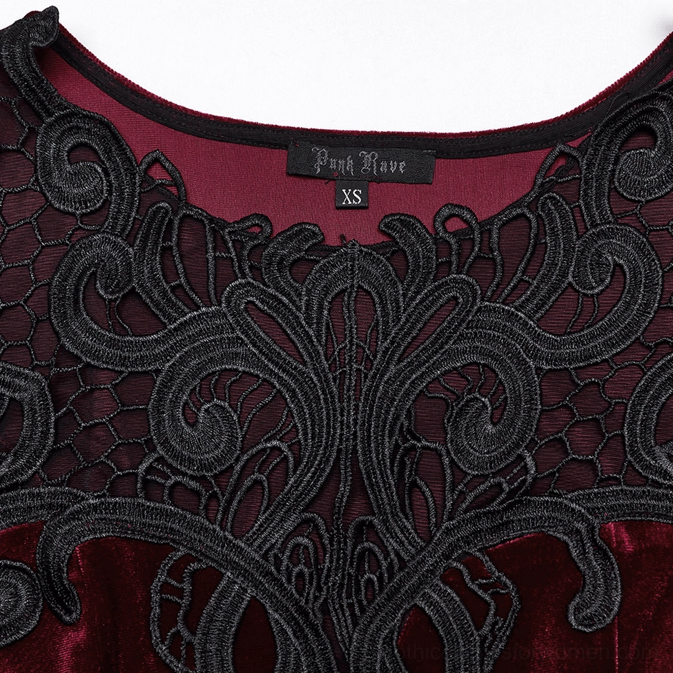 Close-up detail of black sheer floral lace sleeve cuff with pointed edges on gothic dress