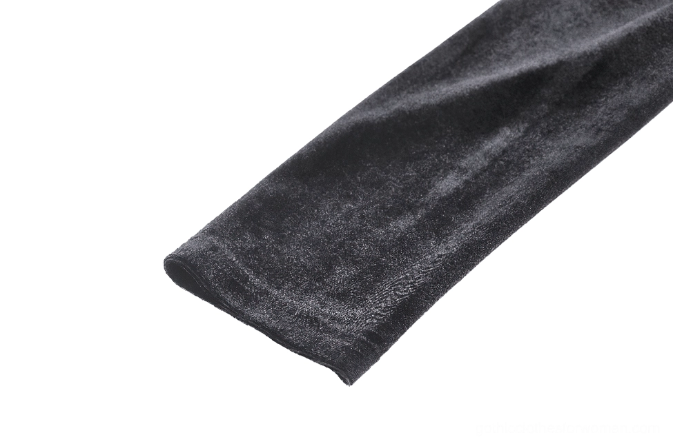 Long sleeve detail close-up of gothic velvet dress showing soft black velvet material and embroidered hem trim