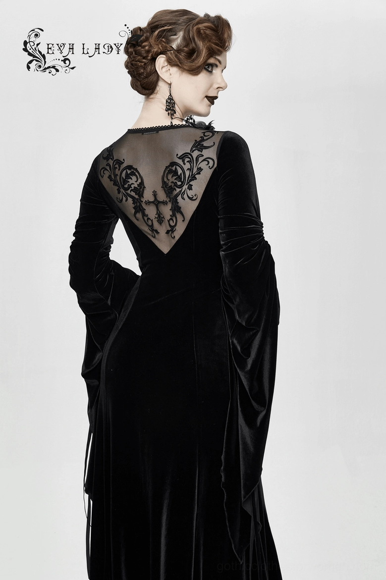 Black velvet gothic dress showing mesh panel and lace trim combination on torso area