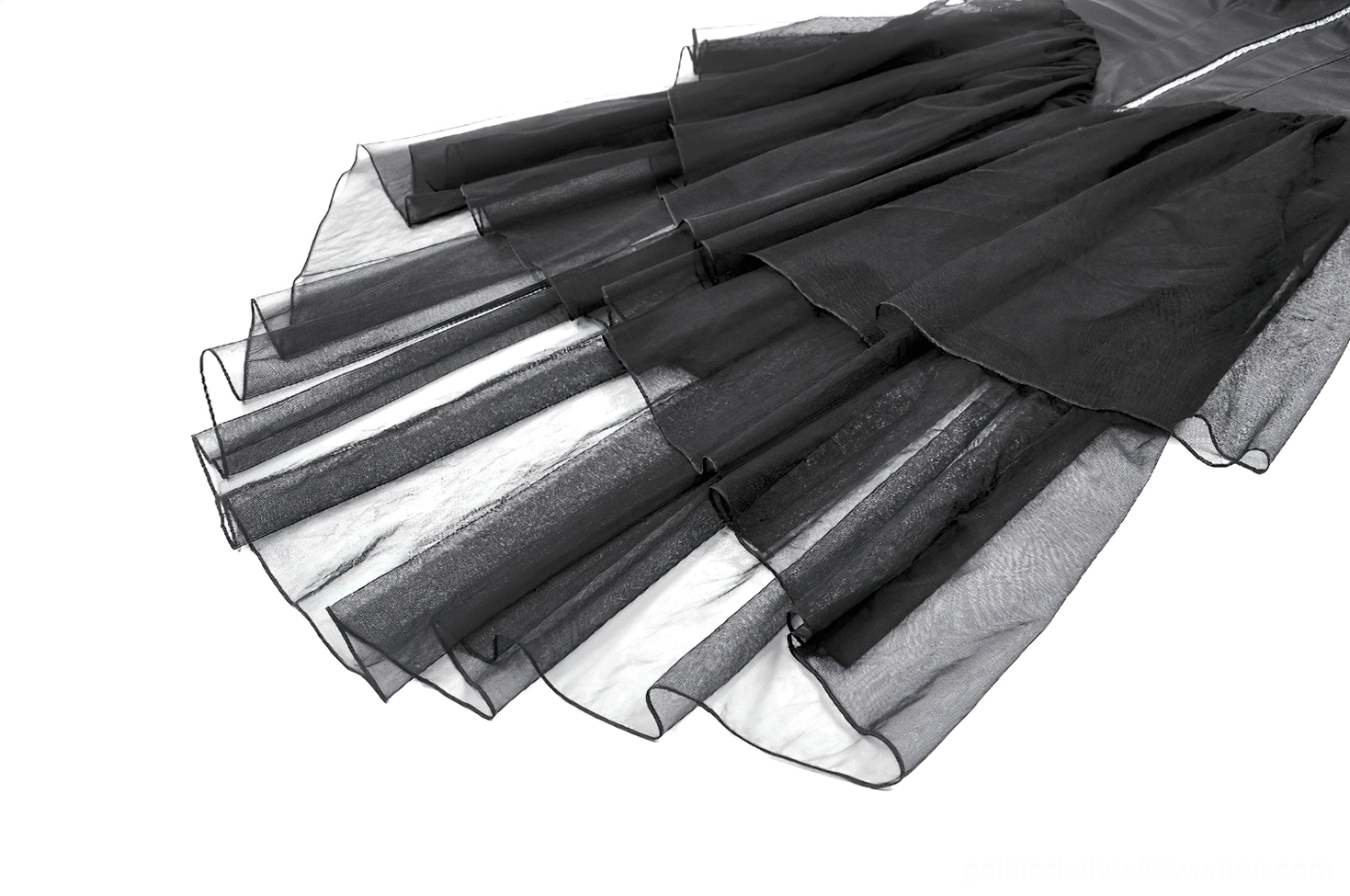 Sheer mesh skirt layers detail showing tiered asymmetrical tulle hem construction
