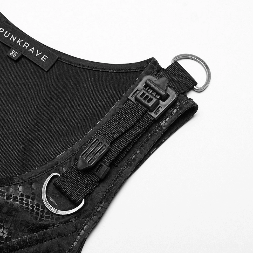 Close-up of gothic dress hardware featuring metal D-rings, plastic buckles, and adjustable webbing straps