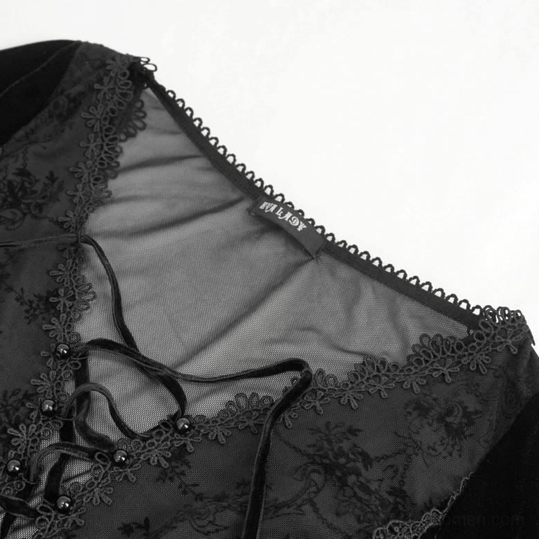 Close-up of Gothic dress neckline and bust area showing lace trim, lace-up front, and decorative black bead buttons