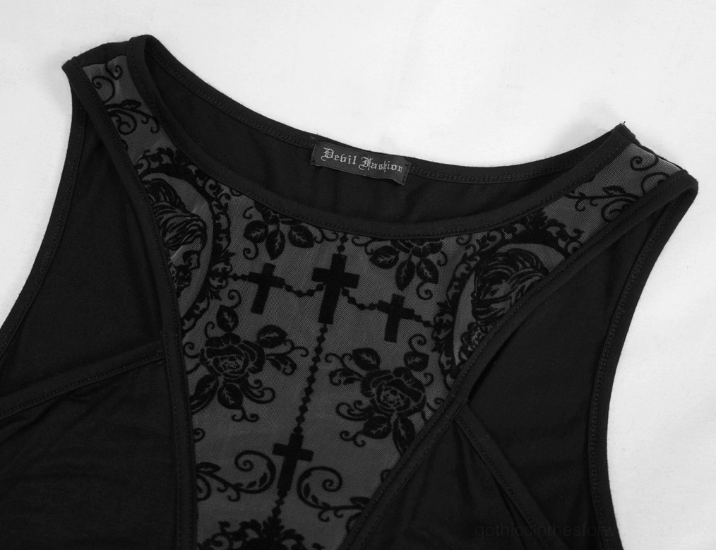 Gothic dress neckline detail showing cross and rose floral lace panel with black fabric trim