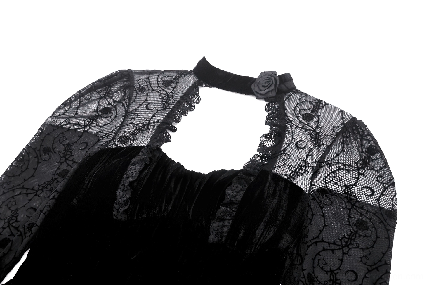 Close-up detail of gothic dress neckline with cutout design, lace trim and velvet fabric
