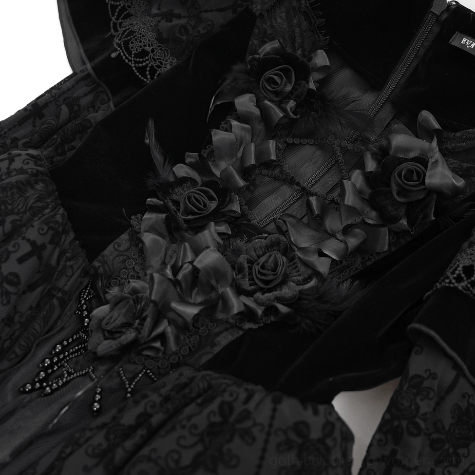 Close-up detail of black gothic dress neckline featuring satin rose ornaments, beaded accents, and mixed lace velvet fabric
