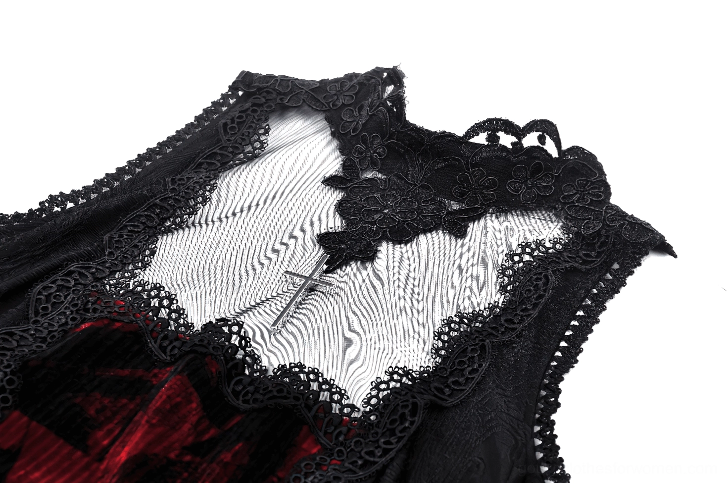 Close-up of gothic dress neckline - sheer mesh with black lace trim and cross ornament