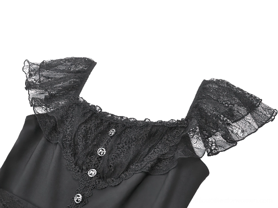 Close-up detail of black gothic dress neckline with lace ruffle sleeves and ornate button trim