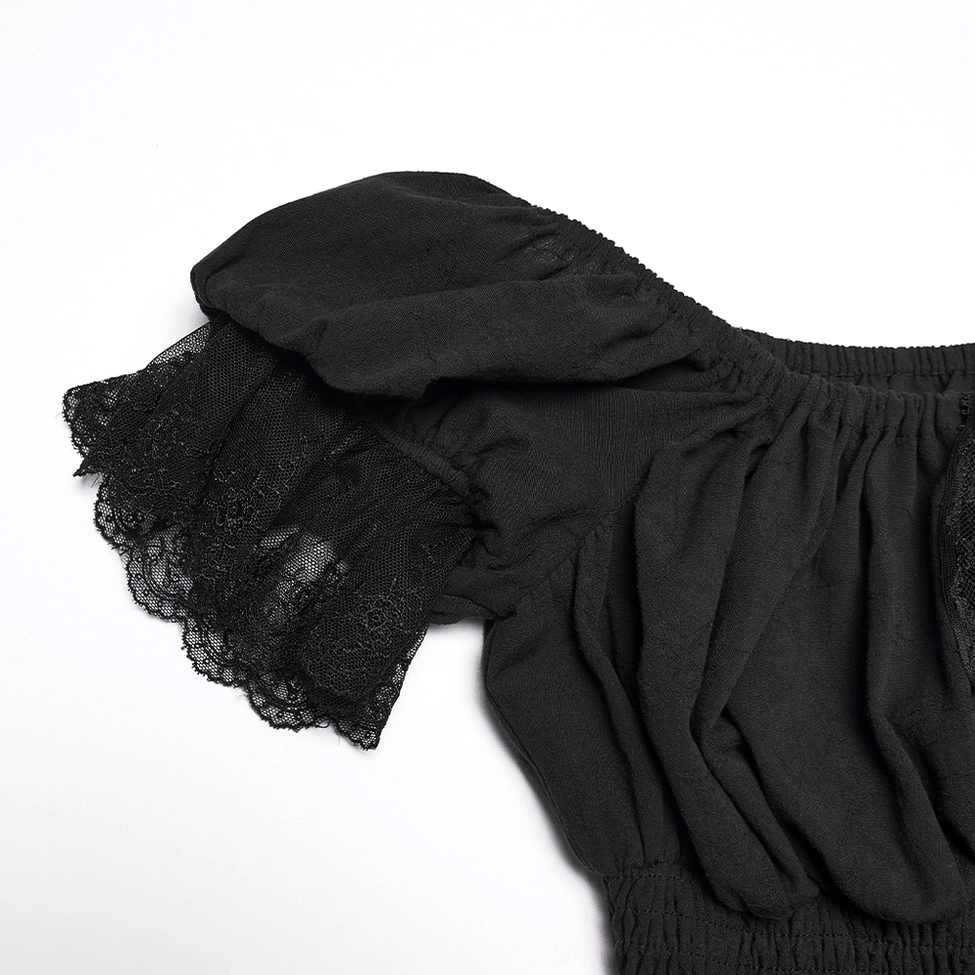 Close-up side detail of gothic maxi dress showing puffed sleeve and black lace trim on ruched fabric