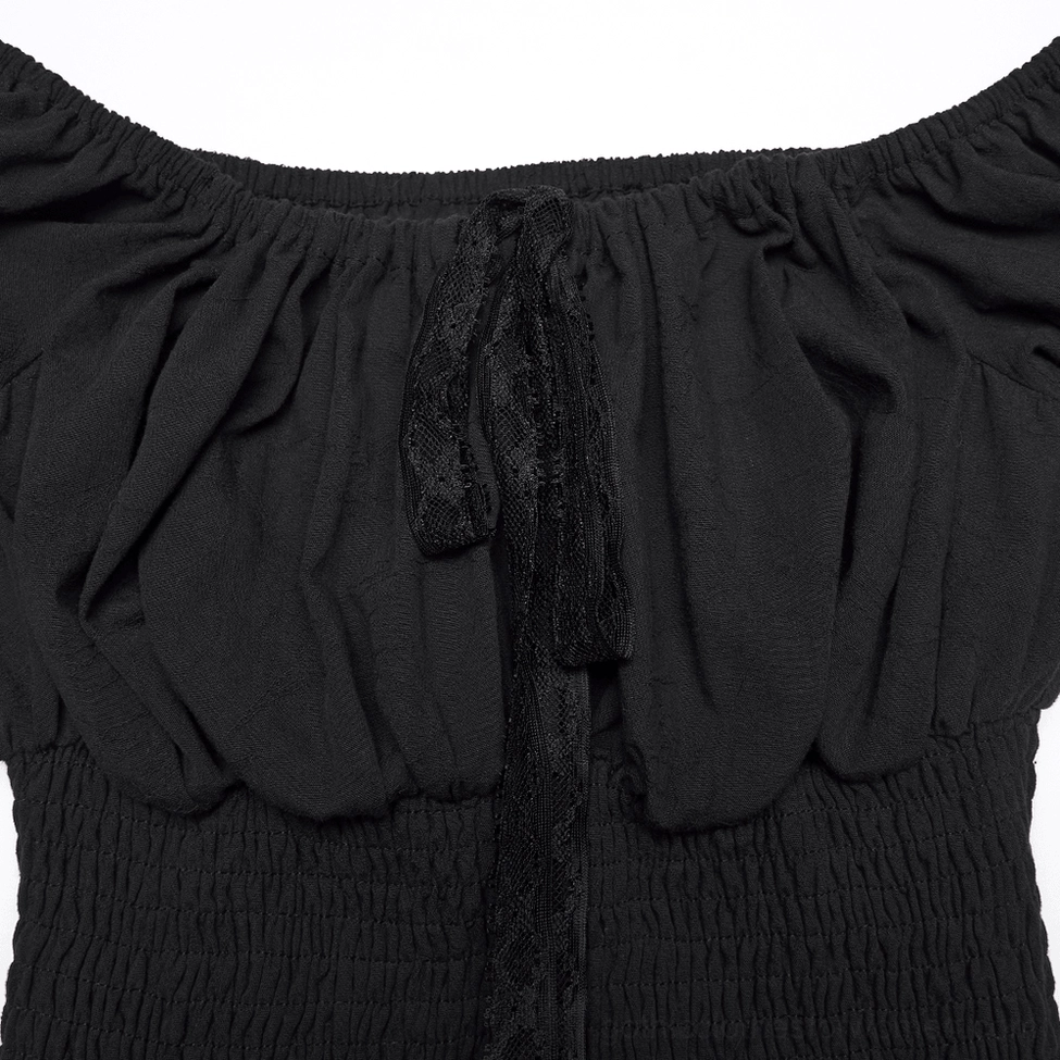 Close-up top view of gothic dress showing ruched fabric detail and smocked waistband