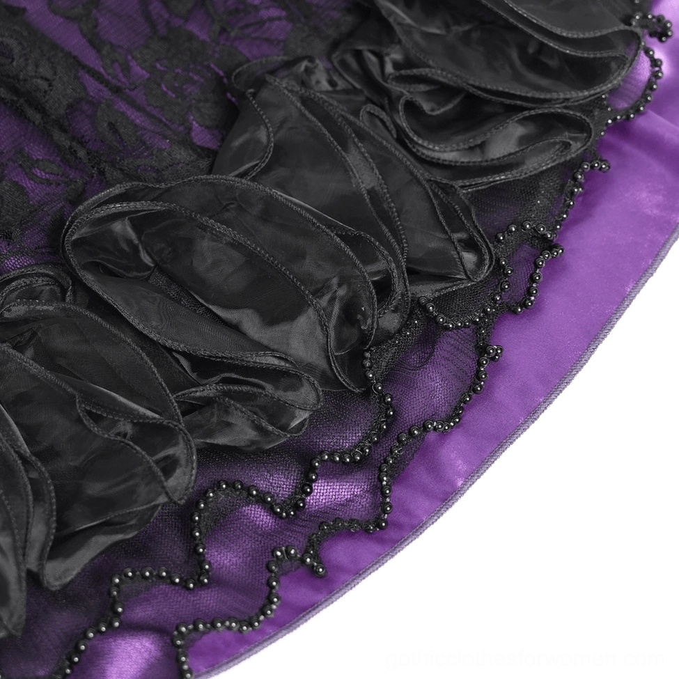 Close-up detail of ruffled satin hem with beaded edge trim and purple satin lining