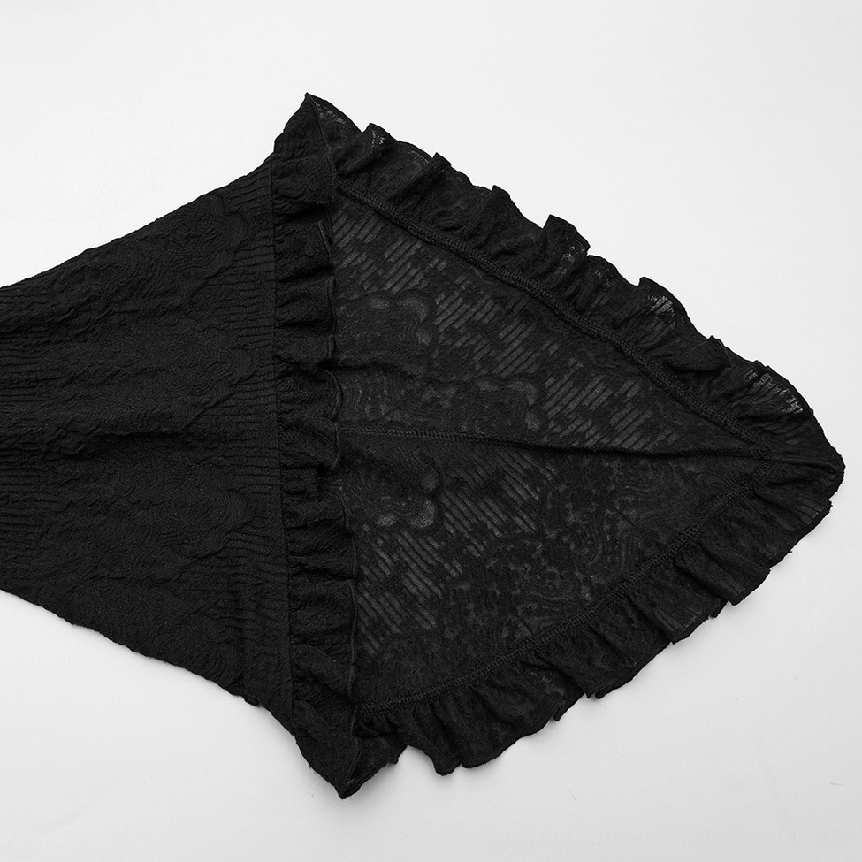Close-up detail of ruffled lace bell sleeve cuff with patterned lace fabric and decorative edge on black gothic dress