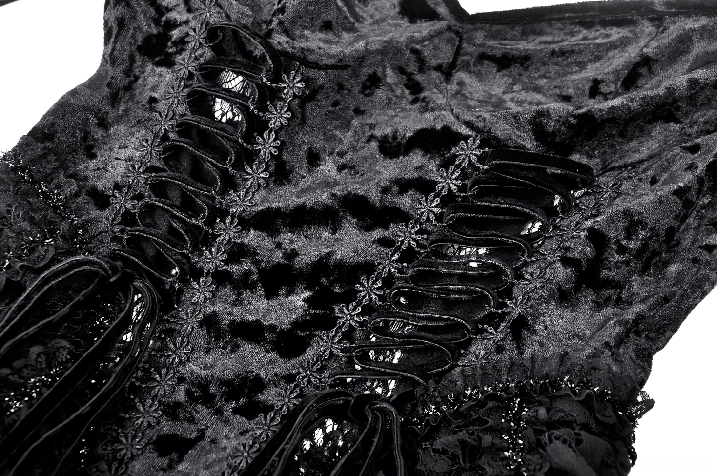 Detailed view of black gothic dress ruffled skirt showing layered ruffles, lace trim, and ruched velvet fabric