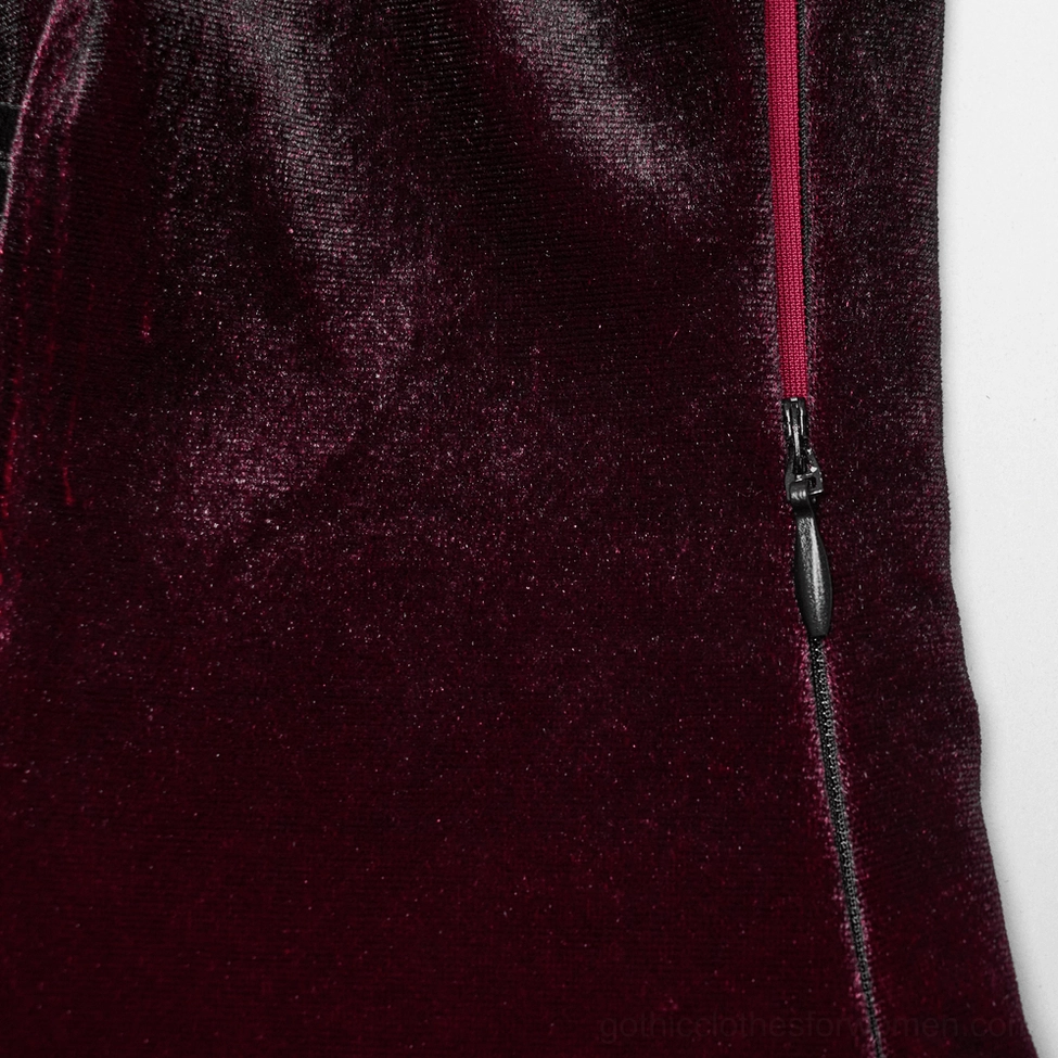 Close-up of burgundy gothic velvet dress side zipper detail showing hidden zip closure and smooth premium velvet surface