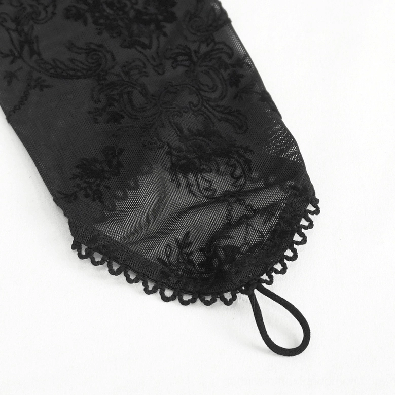 Close-up of Gothic dress flared sleeve cuff detail showing floral embroidered mesh with scalloped edge and loop strap