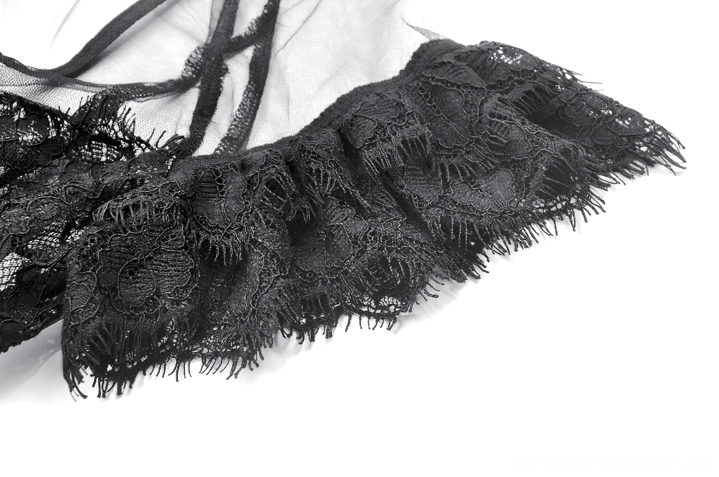 Macro close-up of black gothic dress sleeve lace trim showing eyelash lace and frayed ruffled detail