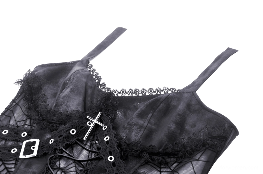 Close-up detail of gothic dress strap and bodice with metal cross ornament, lace trim, and faux leather