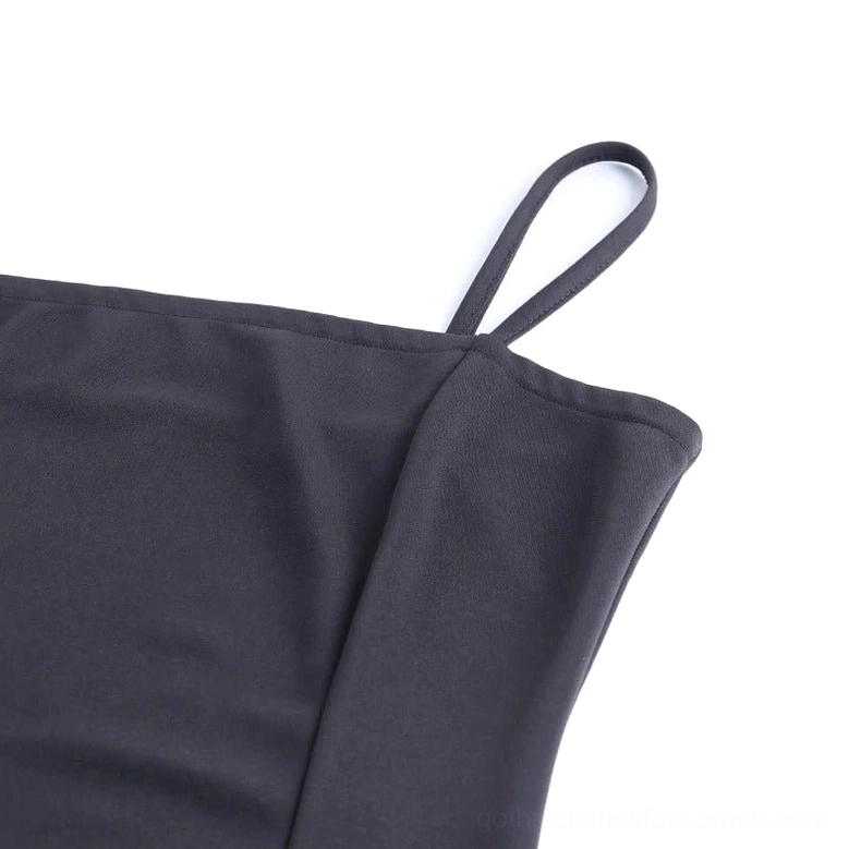Close-up of adjustable spaghetti strap and soft stretch fabric on black gothic mini dress