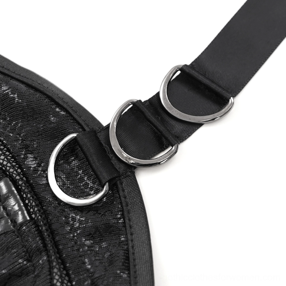 Close-up detail of black gothic dress halter strap hardware showing metal D-rings and adjustable fabric attachment