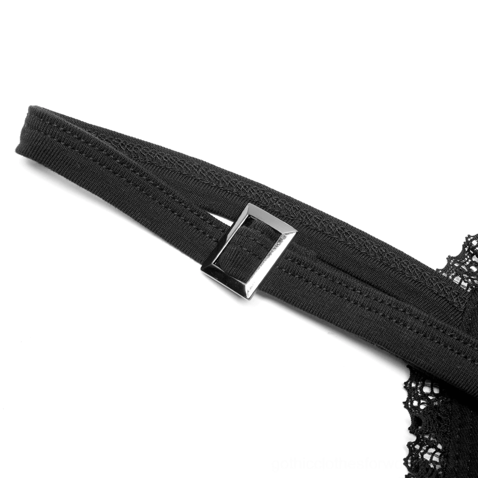 Close-up detail of gothic dress spaghetti strap with metal adjuster buckle and black lace edge trim