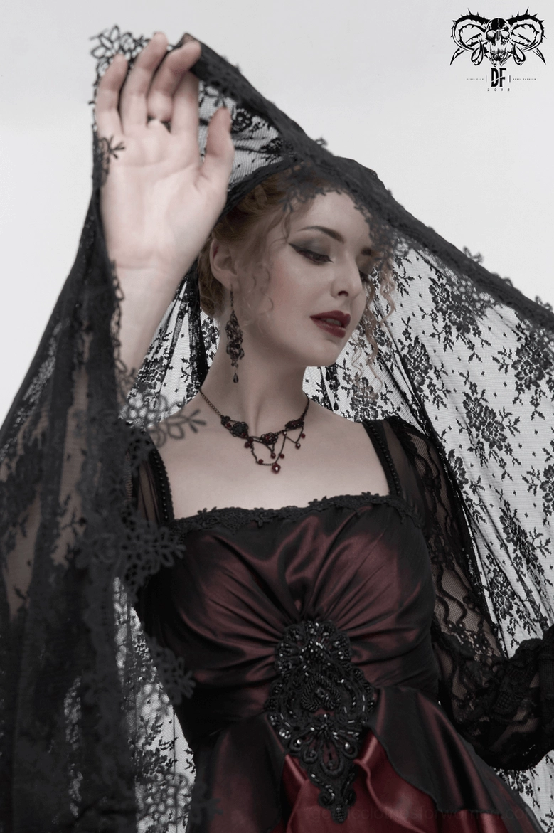 Gothic dress styling detail, wine red maxi length with beaded appliqué and square neckline contrast