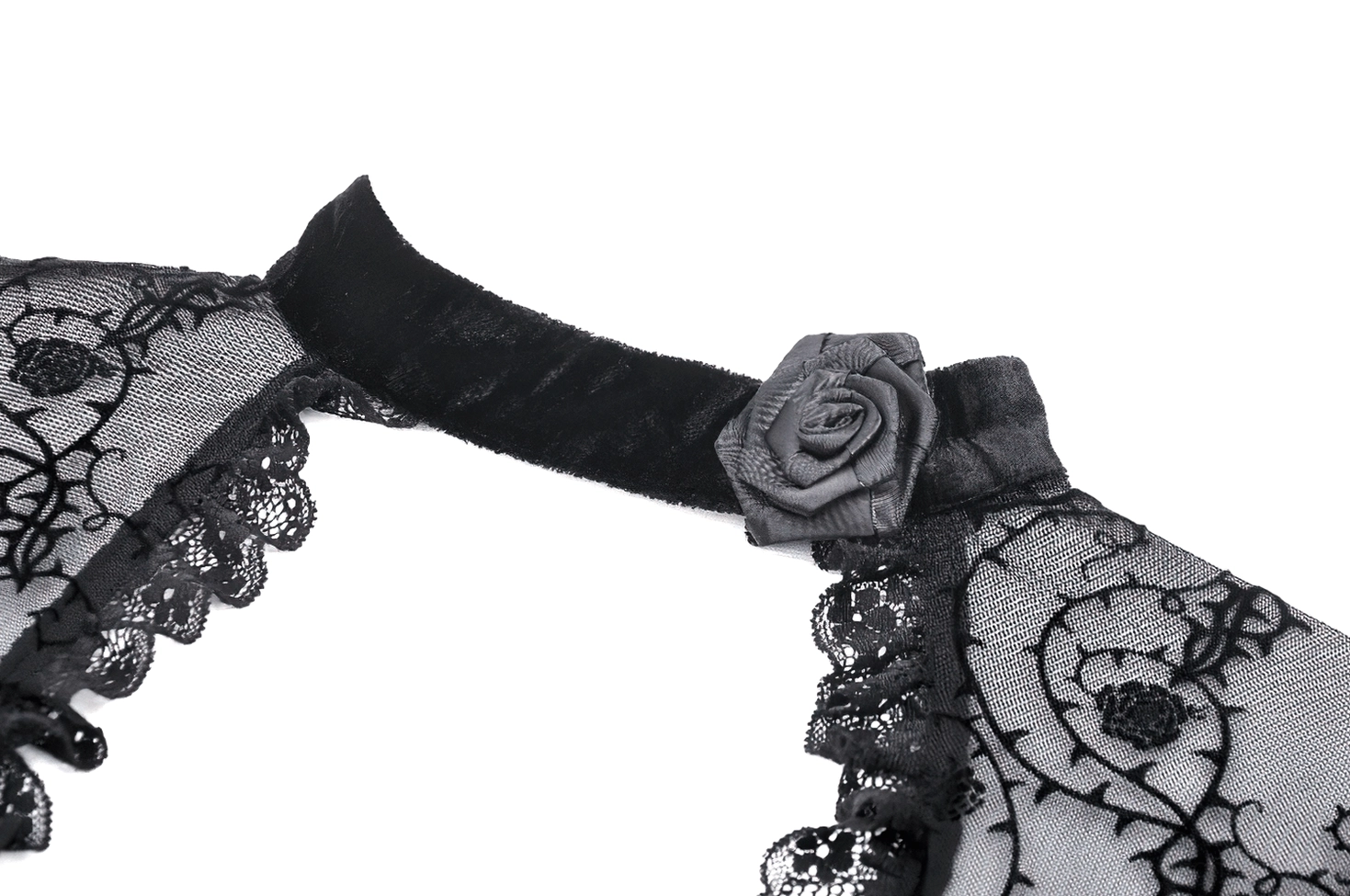 Detail shot of gothic dress velvet choker with ornate fabric rose embellishment