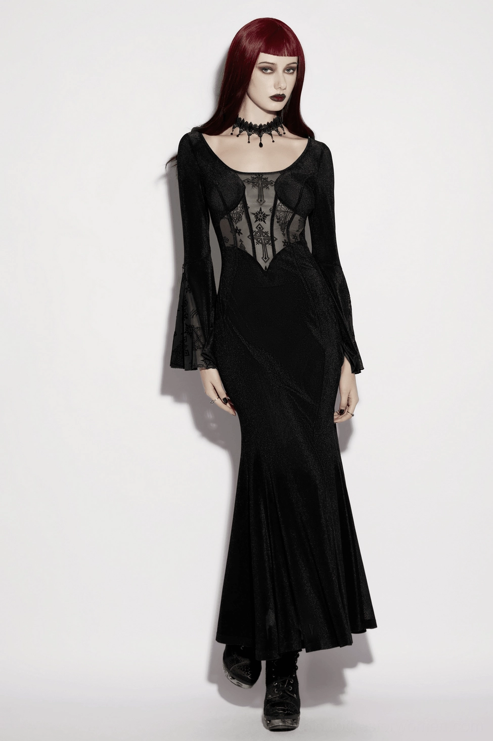 Gothic black dress showing front bodice construction with velvet panels, mesh transparency, and cross detail
