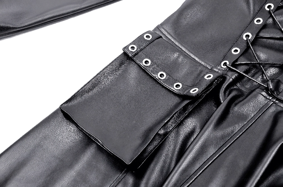 Close-up of black faux leather gothic dress side waist showing buckle straps and utility pocket