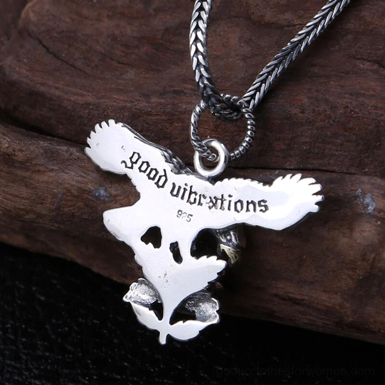 Back engraved view of 925 sterling silver eagle rose pendant showing detailed hollow floral base and 925 hallmark inscription