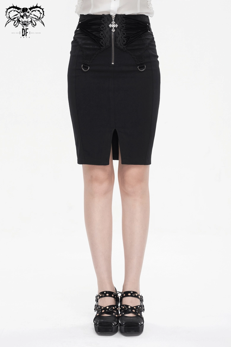 Female model wearing black gothic pencil skirt with platform shoes showing front slit and embroidered details