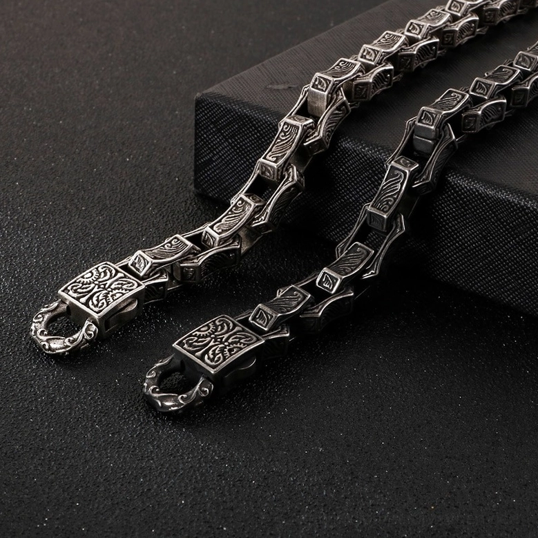 Vintage gothic engraved cuff bracelet stainless steel hidden safety clasp close-up detail