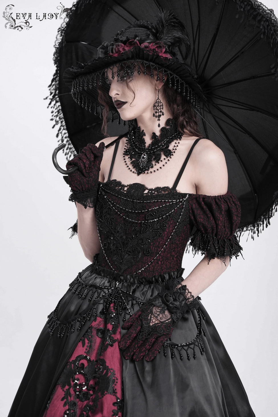Alternative angle view of gothic evening gown highlighting lace-up back closure, structured black satin construction, and Victorian silhouette