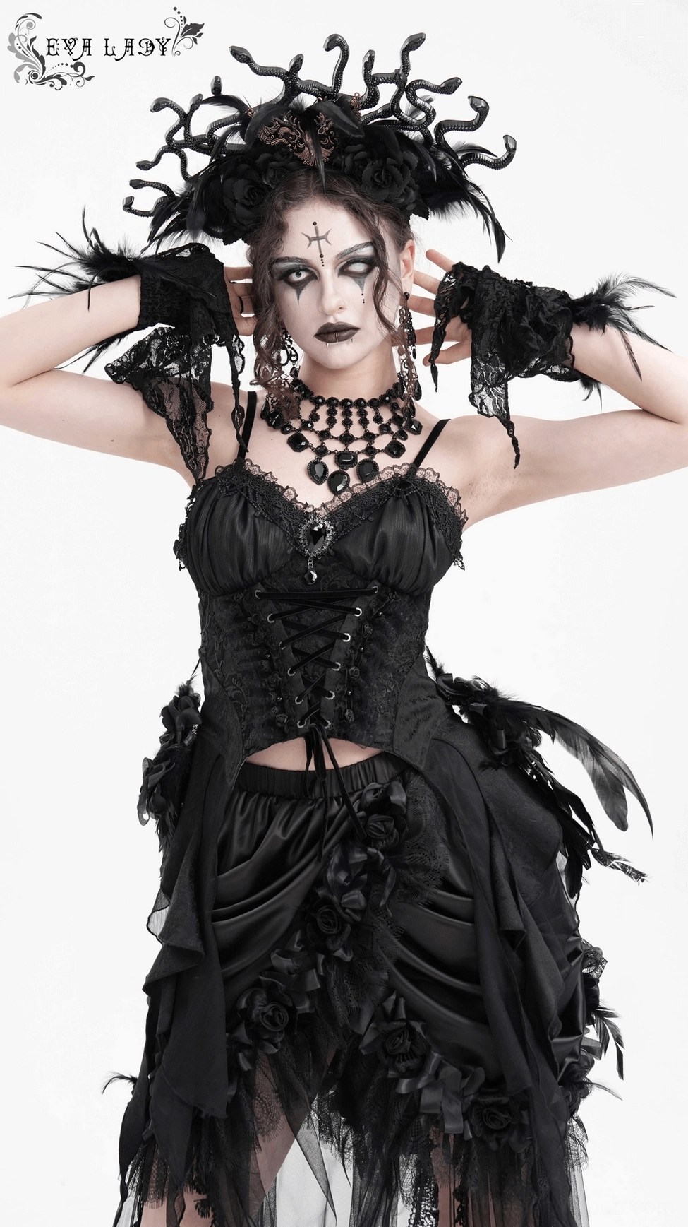 Gothic black feather corset with front lace-up system and dramatic asymmetrical hem silhouette