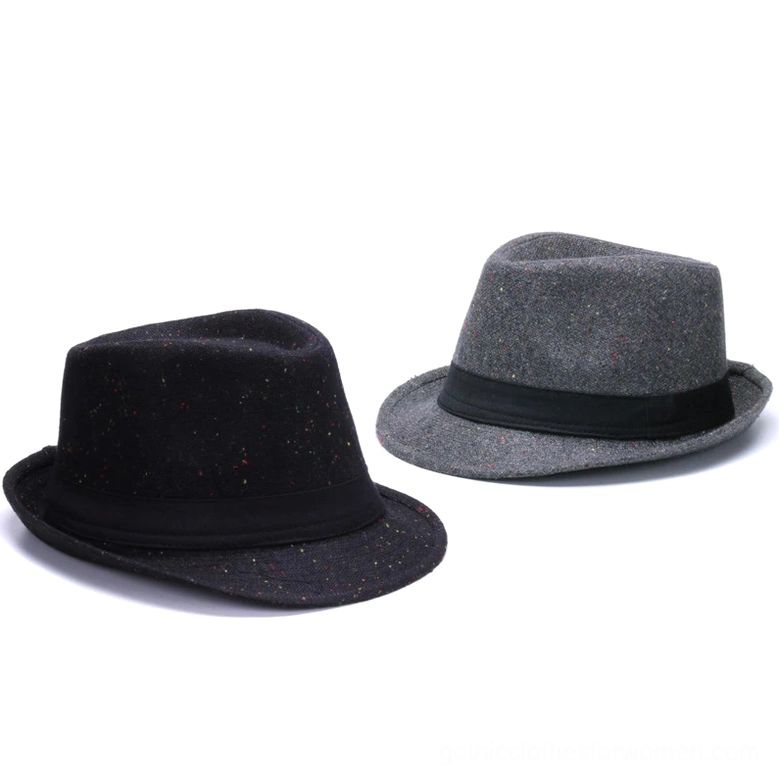 Black and gray gothic fedora hats in flat lay showing speckled and solid wool fabric construction